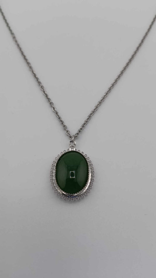 British Columbia Nephrite Jade Cabochon Pendant Necklace in Sterling Silver Setting laying flat